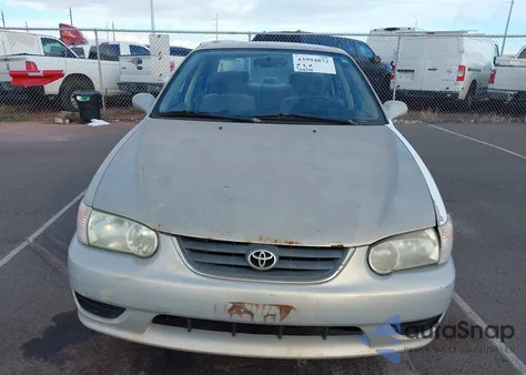 2001 Toyota Corolla Le z USA, uszkodzony, nr VIN 1NXBR12E21Z450378